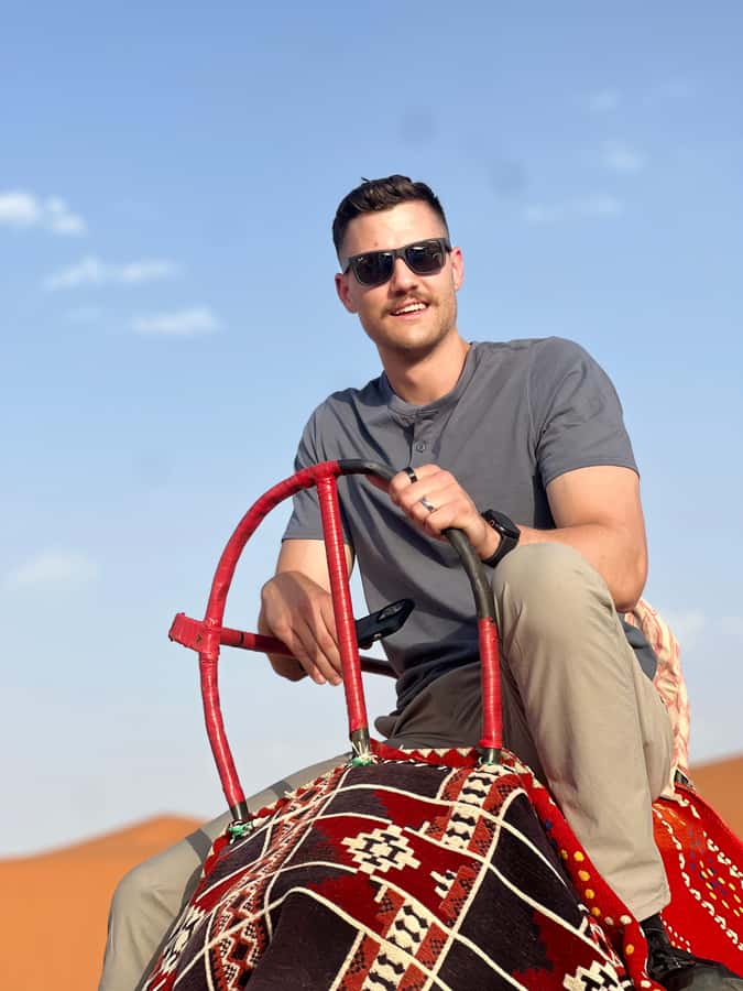 Red Sand: Dunes ATV, + Camel Ride + sandboarding - Sandboarding on Soft Red Sand